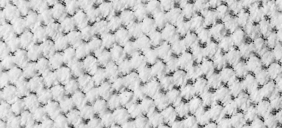 White braided material with an interesting pattern Stock Photos