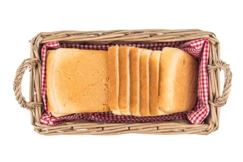 White bread in basket. Slice. Isolated on white background. Stock Photos