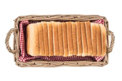 White bread in basket. Slice. Isolated on white background. Stock Photos