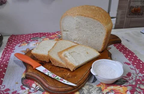 White bread on a board Stock Photos