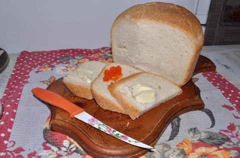 White bread on a board Stock Photos