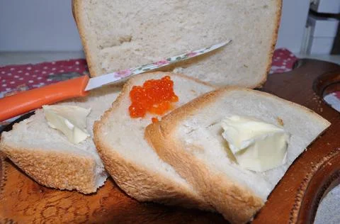 White bread on a board Stock Photos