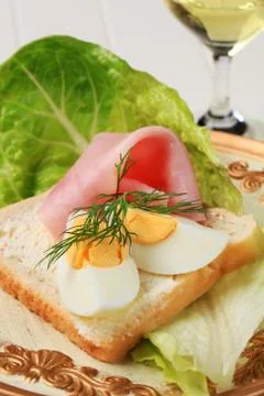 White bread with boiled egg and ham Stock Photos