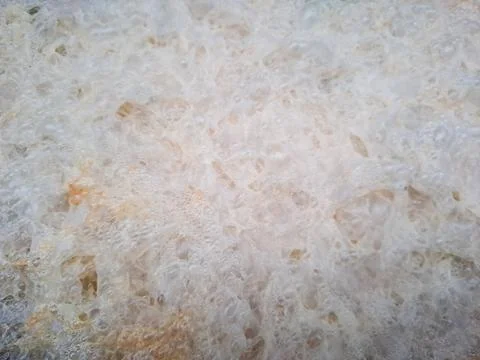 White bread crumb texture with soft porous details, photographed indoors in.. Foto stock
