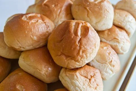 White bread rolls in tray Stock Photos