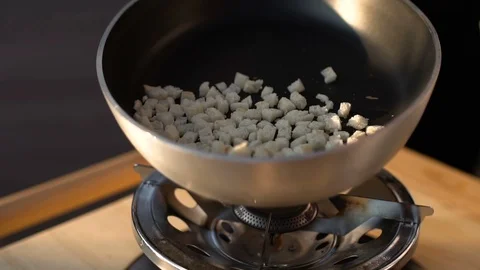 White bread toast, fried in a frying pan with olive oil, slow motion Stock Footage 90401105