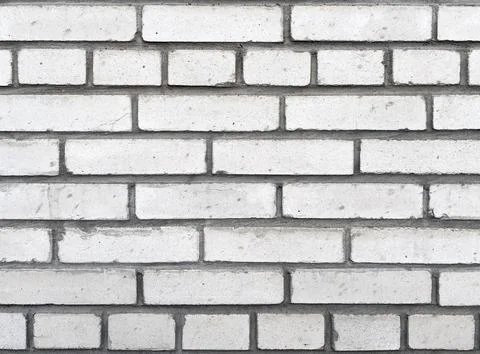 White brick flat wall background with deep grey cement seams. Stock Photos