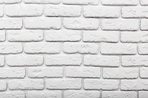 White brick wall background ideal for interior design and construction projects Stock Photos