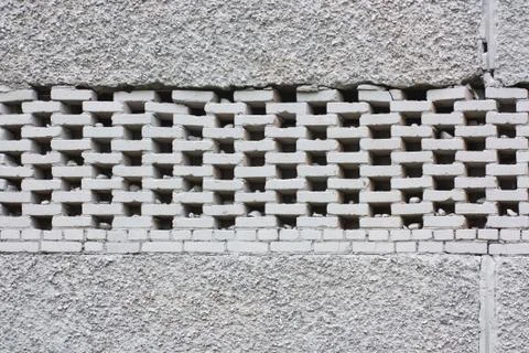 White brick wall background. Neutral texture of a flat brick wall close-up. Stock Photos