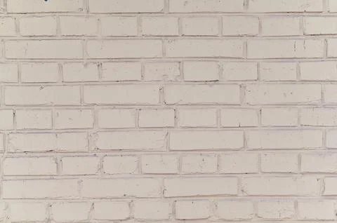 White brick wall background of an old building. Stock Photos