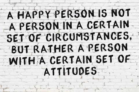  White brick wall with black painted inscription of sensible wise quote on it Stock Illustration