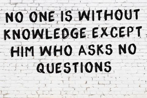  White brick wall with black painted inscription of sensible wise quote on it Stock Illustration