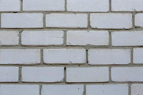 White brick wall. Closeup. Texture. Flat lay. Copy space Stock Photos