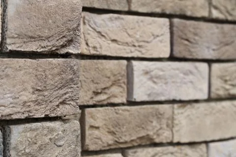 White brick wall corner shape building close up exterior street side perspect Foto stock
