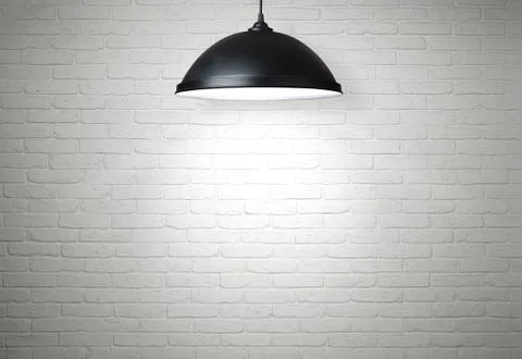 White brick wall illuminated by the lamp with copy space Stock Photos