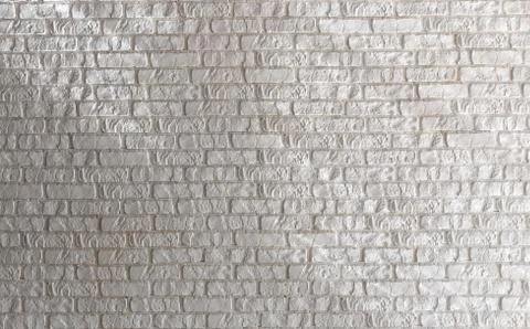 White brick wall with lines of light Foto stock