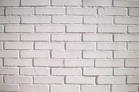 White brick wall pattern gray color of modern style design decorative uneven. Foto stock