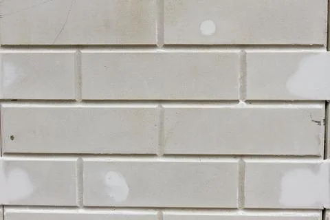 White brick wall, perfect as a background Stock Photos