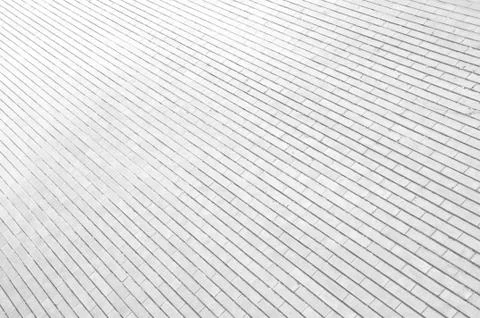White brick wall, perfect as a background Stock Photos