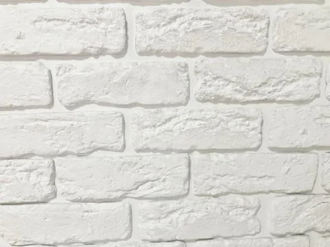 White brick wall, perfect as a background, square photograph. Stock Photos
