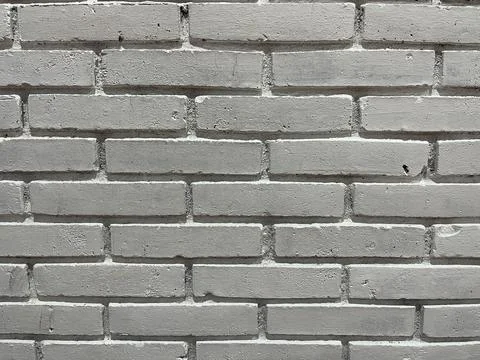 White brick wall with rough texture for pattern background Stock Photos