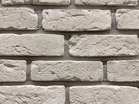 White brick wall texture. Abstract background for design. Close up. Stock Photos
