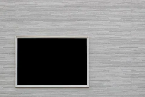 The white brick wall with a  window Stock Photos