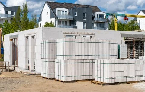 White bricks at a construction site of a building Stock Photos