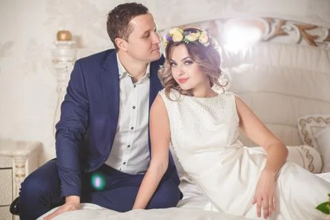 White bride bed groom Stock Photos