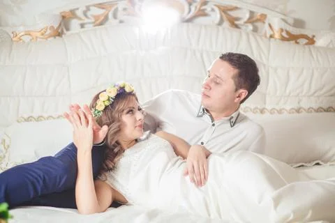White bride bed groom Stock Photos