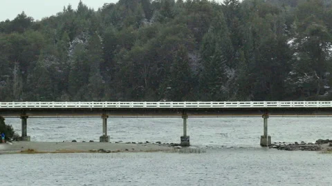 White Bridge Spanning Calm Waters in Argentine Patagonia Stock Footage 334157738