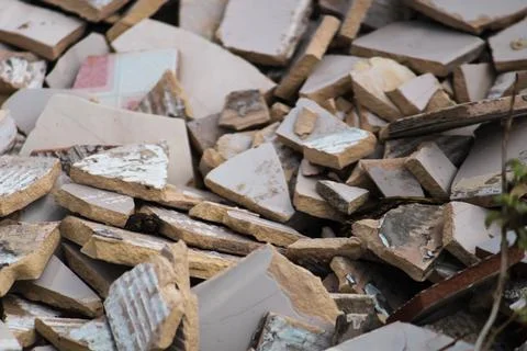 White broken tiles wall texture,selective focus Stock Photos