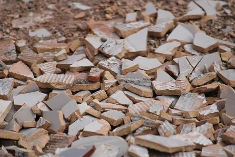 White broken tiles wall texture,selective focus Stock Photos