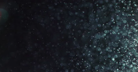 White Bubbles And Particles In Water Against Black Background Stock Footage 167655083