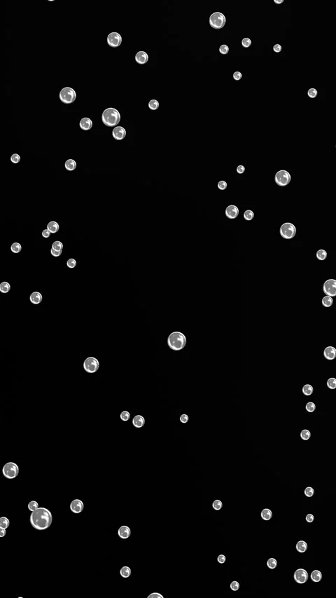 White Bubbles Floating on Black Background Vertical Seamless Loop Stock-Footage 345852914
