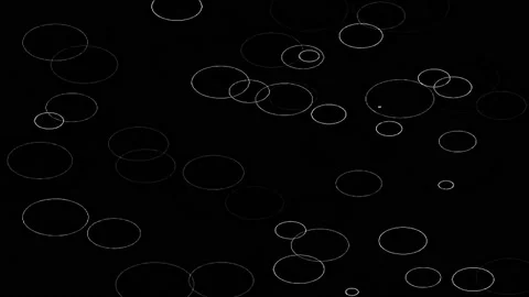 White Bubbles Raindrops On Black Background. 4K Animation Render Stock Footage 206799276