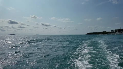 White bubbles from the seawater. Stockbeeldmateriaal 273696245