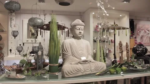 White Buddha statue on table Stock Footage 53080185