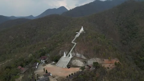 White Buddha Statue Temple Overlooking Mountains in Pai, Mae Hong Son, Thailand Stock Footage 335600812