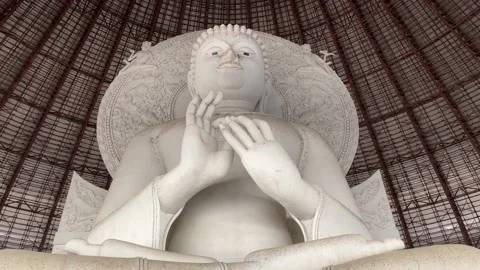 White buddha statue under construction giant dome at Wat Phraphuttha Saengtham Stock Footage 169966138