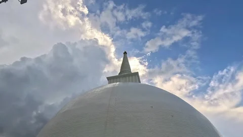 White Buddhist Stupa Under Cloudy Sky in Sri Lanka Stock Footage 344707792