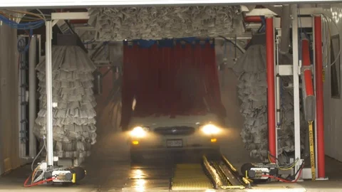 White Buick Lecrosse Going Through Car Wash Video stock 102396853