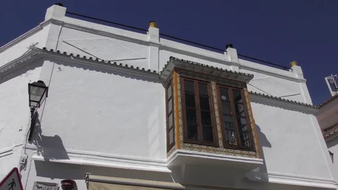 White building decorative window deep blue sky Stock Footage 74700177