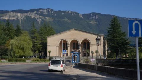 White building with mountains in the background Stock Photos