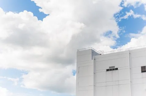 White building in shade of cloud Stock Photos