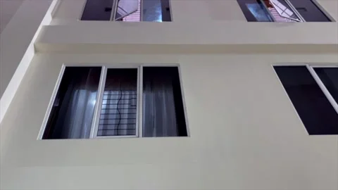 White building wall with glass windows and translucent skylight roof Video stock 332368310