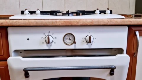 White Built-In Oven Control Panel with Clock and Knobs Stock Footage 321961105
