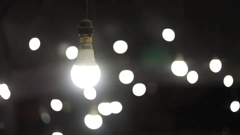 White bulb light bokeh, Dynamic shot Stock Footage 135897409