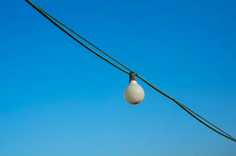 White bulb on wire Stock Photos