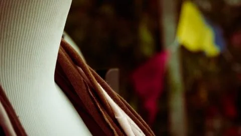 White bumpy surface with red cloth on top Stock Photos